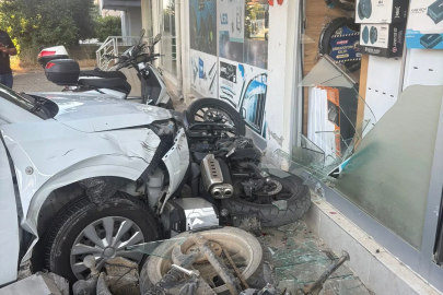 Aracıyla kaldırımı aşıp iş yerine çarptı