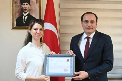 Kaymakam Türker'den öğretmenlere başarı belgesi